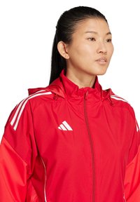 adidas Performance ALLWETTER TIRO COMPETITION - Regenjas - rotlila