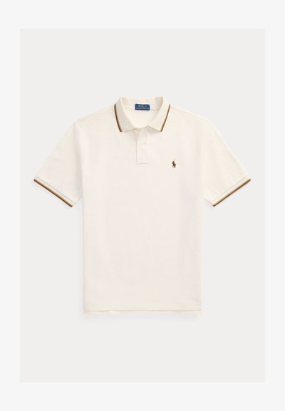 White polo shirt with brown ribbed collar and sleeve cuffs. It features a three-button placket and a small embroidered logo on the chest.