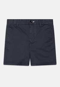 Marina blå shorts tillverkade av en bomullsblandning, med dragkedja, framfickor och en sydd logodetalj nära midjan.