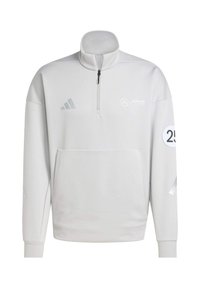 Hvid sweatshirt med halv-lynlås krave, frontlomme og broderede logoer. Har grå accenter og tre-stribet design på ærmerne.