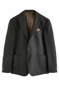 Ciemnoszara marynarka w jodełkę z wąskimi klapami, dwoma przednimi kieszeniami, pojedynczym zapięciem na guzik oraz beżową podszewką. Zawiera poszetkę.