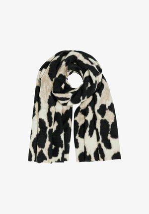 Black and beige cow-print scarf made of soft fabric, featuring a looped design and textured surface for added warmth and comfort.