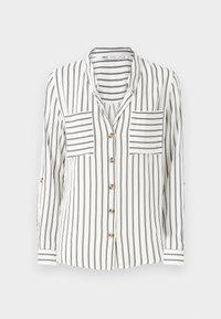 Chemise blanche à manches longues boutonnée avec des rayures noires verticales et deux poches poitrine avant avec des rayures noires horizontales.