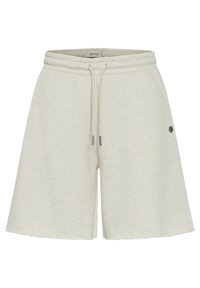 Lys beige shorts laget av myk stoff, med elastisk midjebånd med snor og en liten logo aksent på siden.