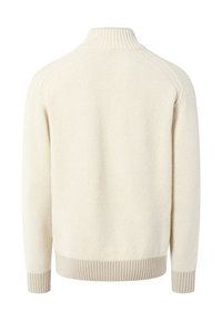 Krämfärgad stickad tröja med hög krage, ribbade ärmslut och nederkant. Mjuk textur, minimalistisk design och inga synliga mönster.