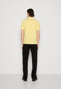 BOSS PRIME - Polo majica - bright yellow