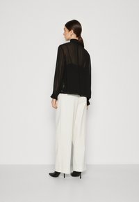 Scotch & Soda TIE NECK - Bluse - evening black