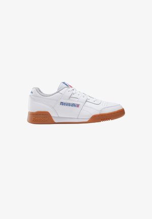 White low-top Reebok sneaker with gum sole, blue Reebok logo and British flag on side, white laces, and cushioned grey inner lining.