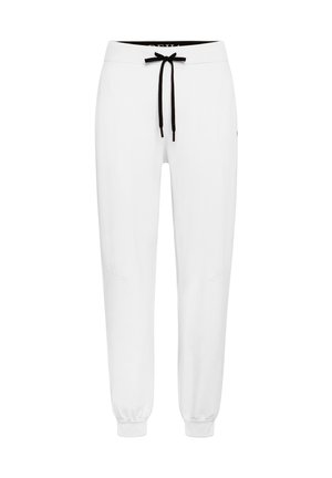 Pantalones de chándal blancos con cordón negro, puños elásticos y bolsillos laterales. Diseño simple con una textura suave y material ligero.