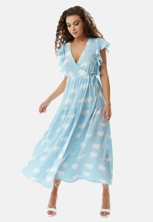 Light blue, long wrap dress with ruffled sleeves and white cloud pattern. Soft, textured fabric and a tied waist detail. Open skirt.