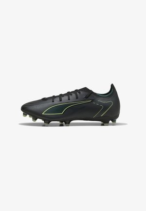 Black football cleat with textured synthetic upper, yellow accents, and six plastic studs for traction. Slim silhouette and lace-up design.