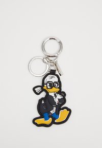 Rubber keychain featuring a cartoon duck in a tuxedo with sunglasses, yellow beak, and blue pants, attached to a metal ring.