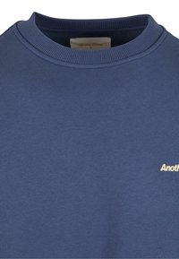 Another Cotton Lab BAD IDEAS GOOD STORYS OVERSIZE - Bluză de molton - blue