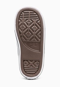 Suela de goma marrón de una zapatilla Converse, con un patrón de diamantes y el texto "Converse ALL STAR", complementada por un borde blanco.