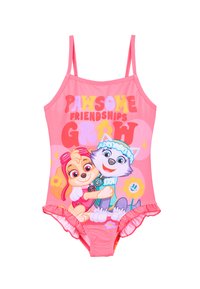 Maillot de bain une pièce rose avec des personnages de chien en cartoon, texte "LES AMITIÉS INCROYABLES GRANDISSENT", bords volants et motifs floraux.
