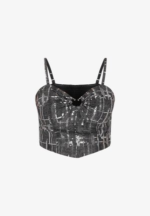 Czarny krótki top na cienkich ramiączkach, ozdobiony srebrnymi cekinami ułożonymi w geometryczny wzór kratki, z małym otworem na przedzie.