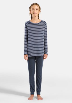 Gray striped long-sleeve top with round neckline, paired with solid dark gray, fitted pajama pants. Fabric appears soft and comfortable.