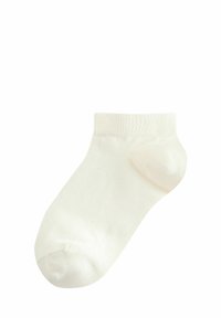 Knöchelsocke in hellem Creme, aus weichem Stoff gefertigt, mit geripptem Textur am Bündchen und einem verstärkten Zehenbereich. Schlichtes, einfarbiges Design.