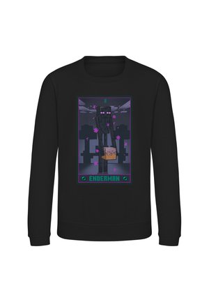Felpa nera con un personaggio Enderman pixelato che tiene un blocco con particelle viola, etichettata con ""ENDERMAN"" in testo verde.