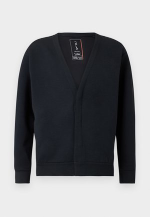 Sort bomulds-sweatshirt med V-hals, lange ærmer og lige kant. Har en subtil tekstur og et synligt mærke ved halsudskæringen.