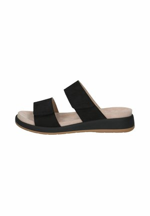 Zwarte slipper sandalen met suède banden en een beige gevoerde voetbed. Voorzien van een lage, slipvaste rubberen zool voor comfort en stabiliteit.