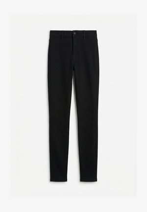 Jean skinny noir à taille haute avec passants de ceinture, bouton avant et fermeture éclair, présenté à plat sur un fond blanc.