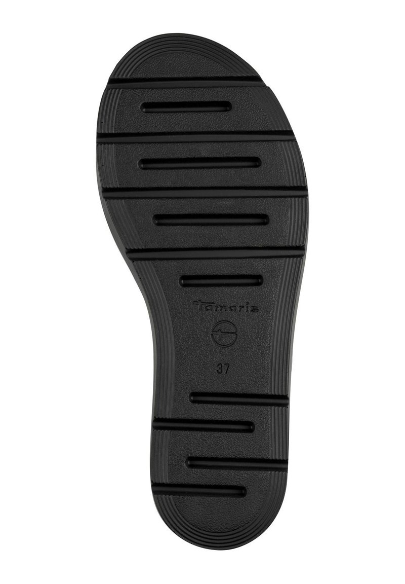 Schwarze Gummisohle mit horizontalen Rillen, strukturiertem Oberflächen und dem eingeprägten Markennamen "Tamaris" in Größe "37".