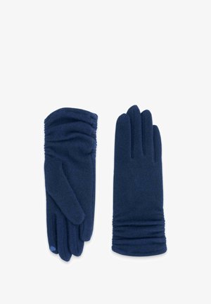 Gants bleu marine en tissu doux et texturé. Présentent des détails froncés au poignet et un design classique à cinq doigts.