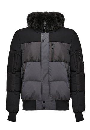 Padded jacket in black and dark gray, featuring a faux fur collar, zippered pockets, and ribbed cuffs and waistband for a snug fit.