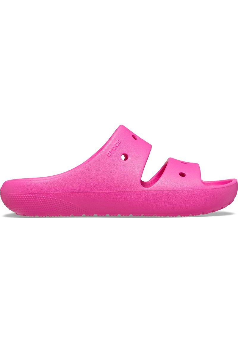 Sandal in schiuma rosa a slip-on con punta aperta, due tagli superiori, fori di ventilazione e suola testurizzata per una maggiore aderenza. Design leggero.