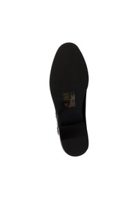 Semelle de chaussure noire avec une texture lisse, une forme légèrement arrondie et une semelle extérieure fine et flexible. Comprend des marquages du fabricant pour les tailles.