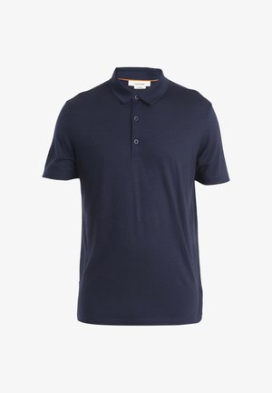 Polo shirt blu navy in cotone con colletto classico, patta con tre bottoni e maniche corte. Texture liscia, design minimale.