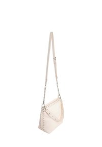 Beige crossbody bag in smooth material featuring silver studs along the edge, adjustable strap, and a chain accent.