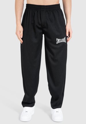 CLASSIC RIPP - Tracksuit bottoms - schwarz
