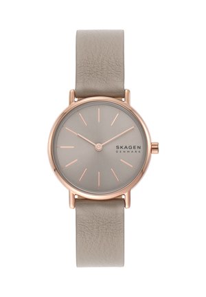 Runde Roségold-Uhr mit beigem Lederarmband, minimalistischem Zifferblatt und SKAGEN Denmark-Logo bei 3 Uhr.