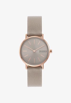 Runde Roségold-Uhr mit beigem Lederarmband, minimalistischem Zifferblatt und SKAGEN Denmark-Logo bei 3 Uhr.