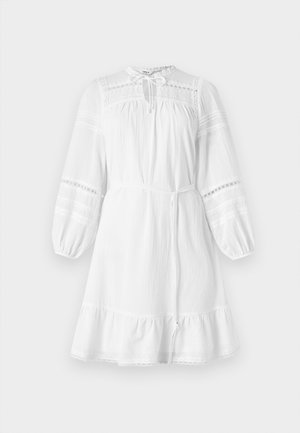 White cotton dress with long sleeves, a gathered neckline, lace trim accents, and a detachable waist tie. Features a ruffled hem.