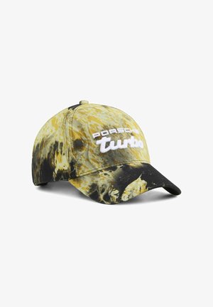 Cap in yellow and black tie-dye pattern, featuring white embroidered "Porsche Turbo" logo on the front, with a curved brim.