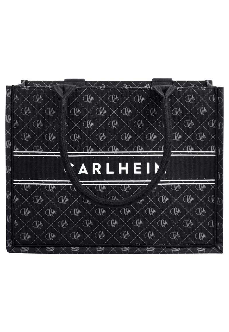 Black tote bag made of patterned material with white branding. Features two sturdy handles and a rectangular shape.