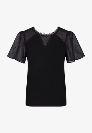 Sort top med en ensfarvet krop og gennemsigtige pufærmer. Halsudskæringen er pyntet med delikate blonder og et diskret prikket mønster.