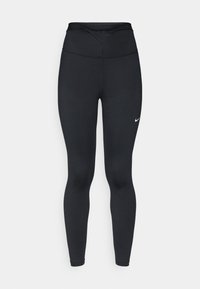 Leggings noirs fabriqués en tissu extensible avec une taille haute. Ils présentent des coutures plates et un petit logo blanc sur le bas à gauche.