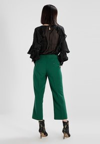 mint&berry Tygbyxor - green