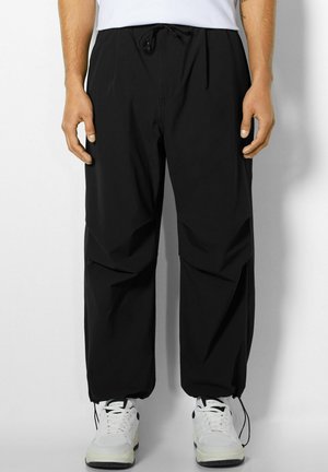 TECHNICAL - Verryttelyhousut - black