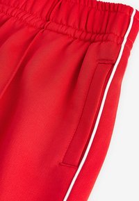 Next REGULAR FIT - Pantalon de survêtement - red