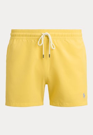 Κίτρινα μαγιό σορτς με ελαστική μέση και λευκό κορδόνι, με μικρό κεντημένο λογότυπο παίκτη πόλο στο αριστερό πόδι.