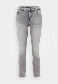 Grå smale jeans med en falmet vask, med en standard linning, fem lommer og sømmer ved sømmene. Glatt denimtekstur.