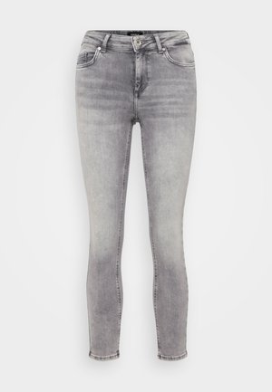 Jeans skinny gri cu un finisaj decolorat, având un tiv standard, cinci buzunare și cusături la cusături. Textură netedă de denim.
