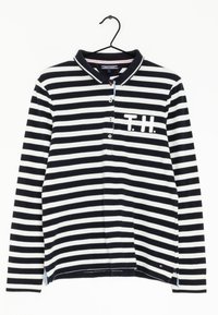 Marinblå och vit randig långärmad polotröja med krage, knäppning framtill och T.H. text på vänster bröst. Strukturerad bomullstyg.
