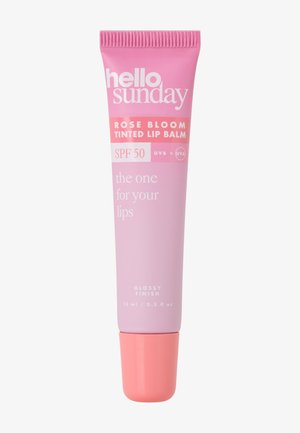 Tube rose de baume à lèvres teinté Hello Sunday Rose Bloom avec SPF 50, fini brillant, 15 ml, conçu pour protéger et colorer les lèvres.