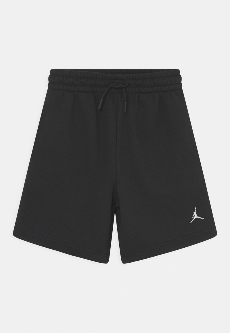 Shorts de sport noirs avec taille élastique et cordon, avec un petit logo Jumpman blanc sur la partie inférieure de la jambe droite.